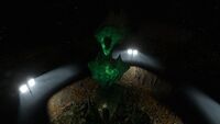 A close-up of the Alien Statue's face