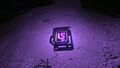 The Purple Artifact on Mountain Island just above the Quarantine Enforcement Platform, at night.