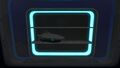 A Wall Shelf with a Starship Souvenir