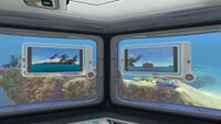 Two Picture Frames placed inside a Multipurpose Room showing screenshots.