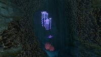 A small cave on the outskirts of the biome, housing Drooping Stingers