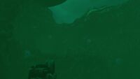 A small cavern beneath the brine surface