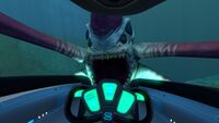 A Reaper Leviathan attacking a Seamoth, viewed from the inside