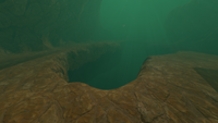 Drop-off into a large pit