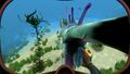 A Stalker trying to eat the Peeper in the player's hand