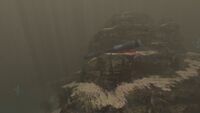 A massive, underwater rocky mountain separating the Crash Zone Trench and the Grassy Plateaus