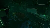 An aquarium inside the Disease Research Facility containing the skeleton of an extinct life form