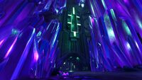 Several Morganite crystals around the entrance of the Crystal Caves Cache.