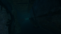 Compact hallway, eastern hole leading outside.