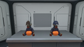 The two Cap variations being worn by Arcade Gorge Toys on a Counter.