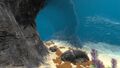 The island cave opening underwater. Located at "Warp 230 -125 995"